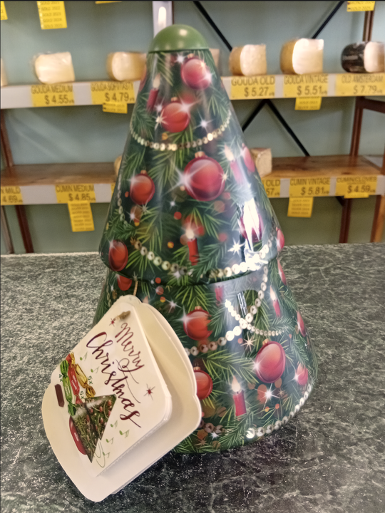 Christmas Tree Music Box Containing Chocolate Pralines